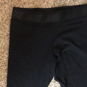 Woman’s black Nike leggings